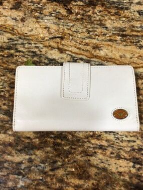 Texas Longhorns fossil brand wallet. Great shape.